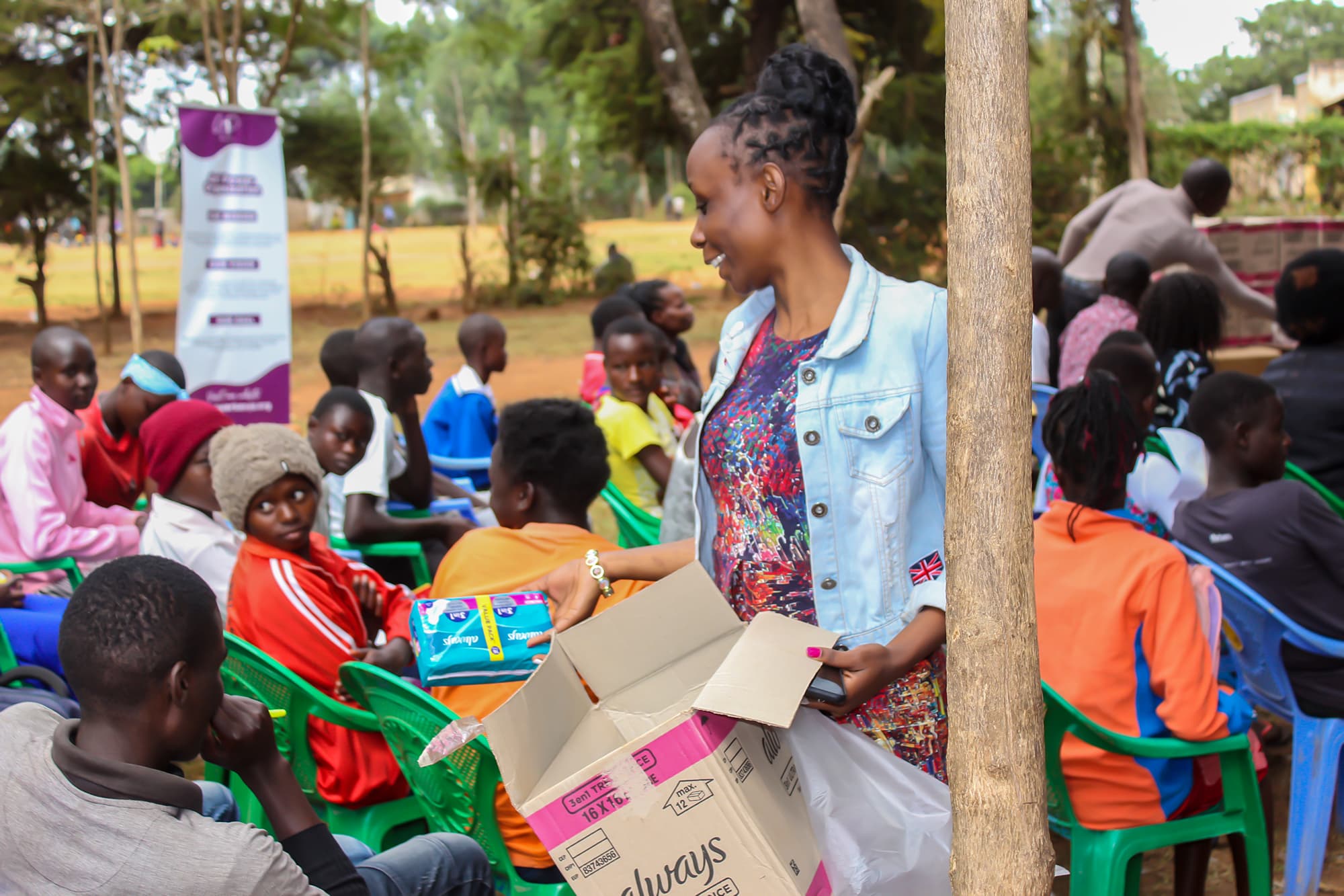 Young women receiving menstrual hygiene products
